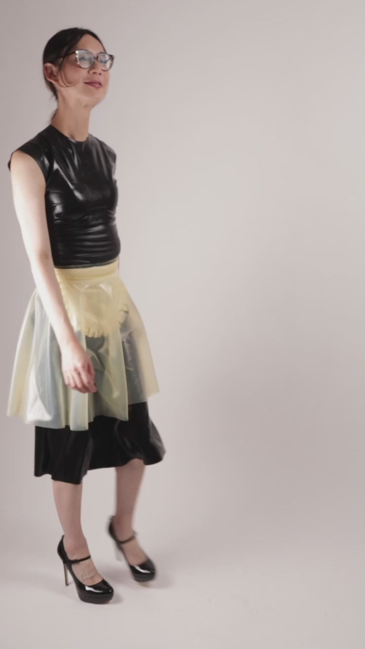 our model hani in the impossible maid dress. please note that the apron is under the transparent over-skirt. quite useless.