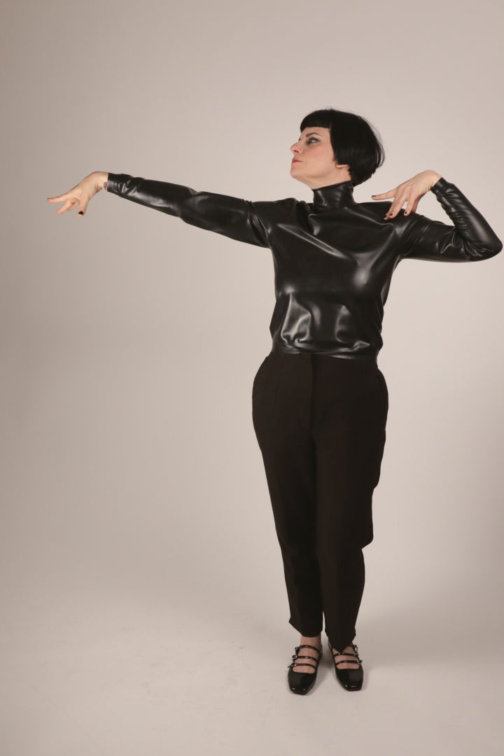 anja vogueing in our loose black latex turtleneck
