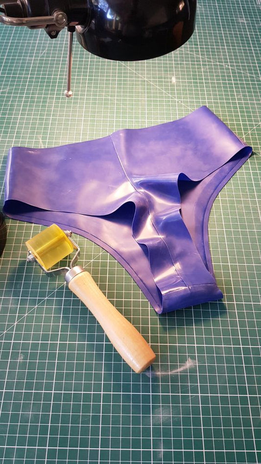 blue-latex-brazilian-panty-rear-view-on-cutting-mat
