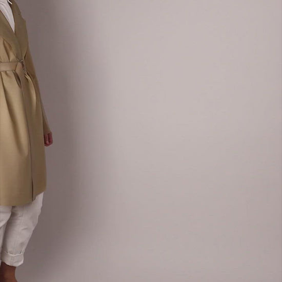 funny-video-of-camel-colored-latex-trenchcoat