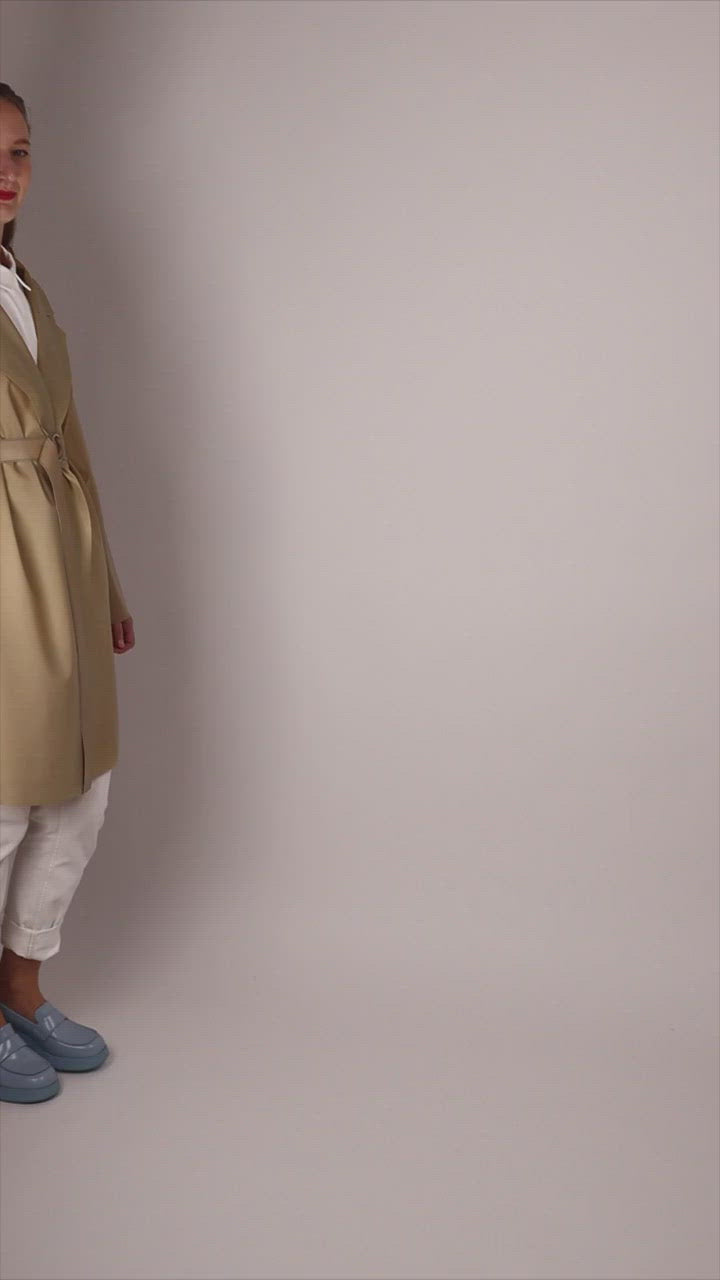 funny-video-of-camel-colored-latex-trenchcoat