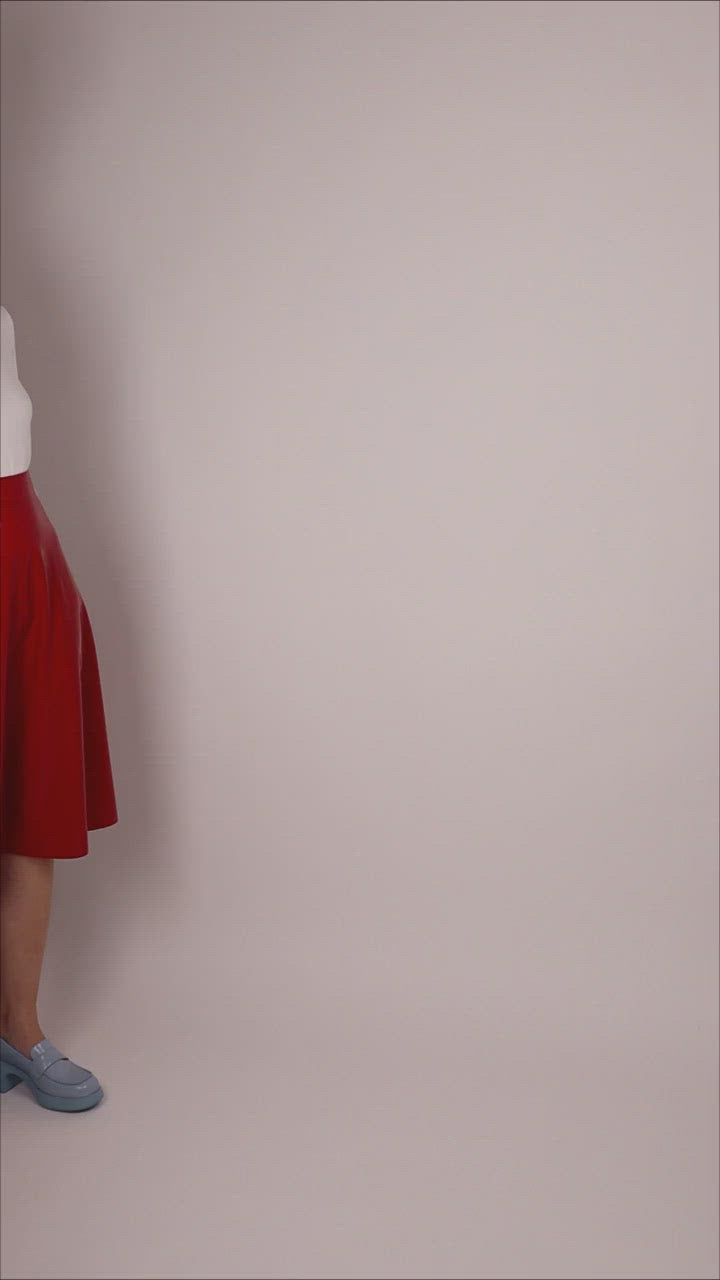 video of red latex midi skirt
