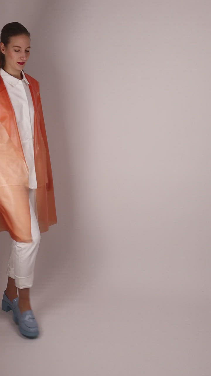 video-of-coat-in-transparent-salmon-latex