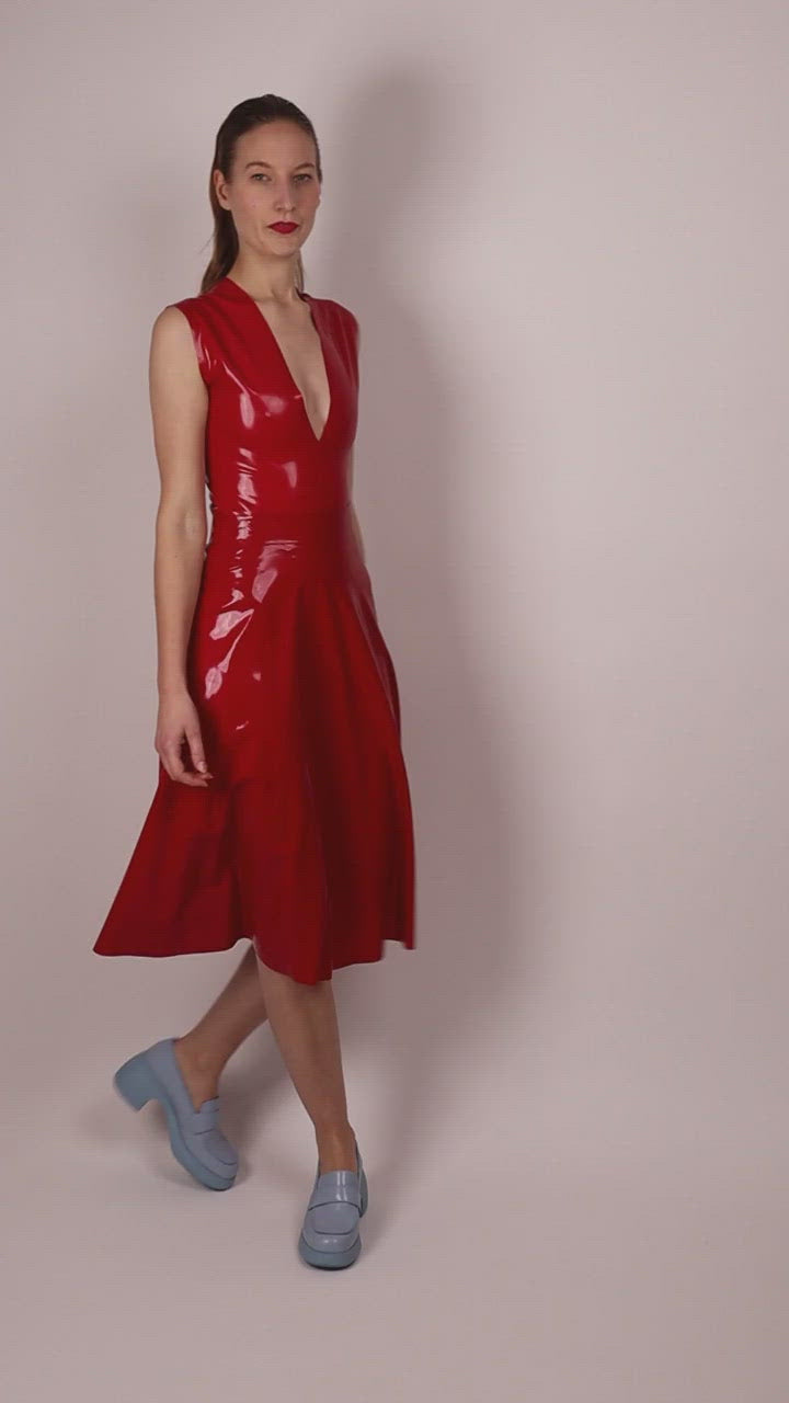 video-of-model-in-red-latex-v-neck-swimsuit-body-and-matching-latex-a-line-skirt