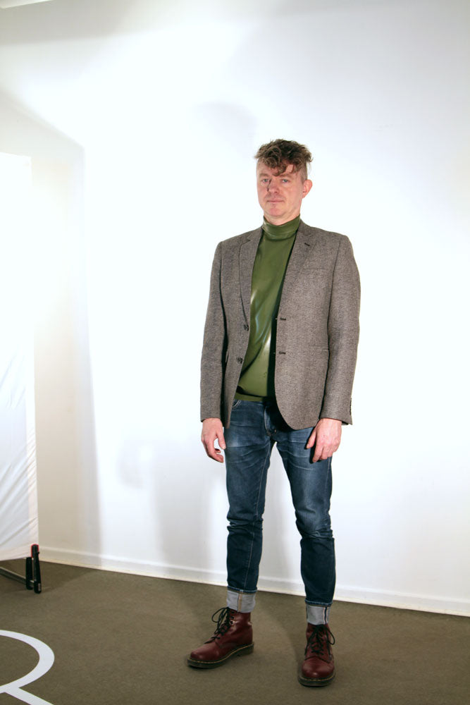 green-latex-turtleneck-sweater-combined-with-jacket-and-skinny-jeans