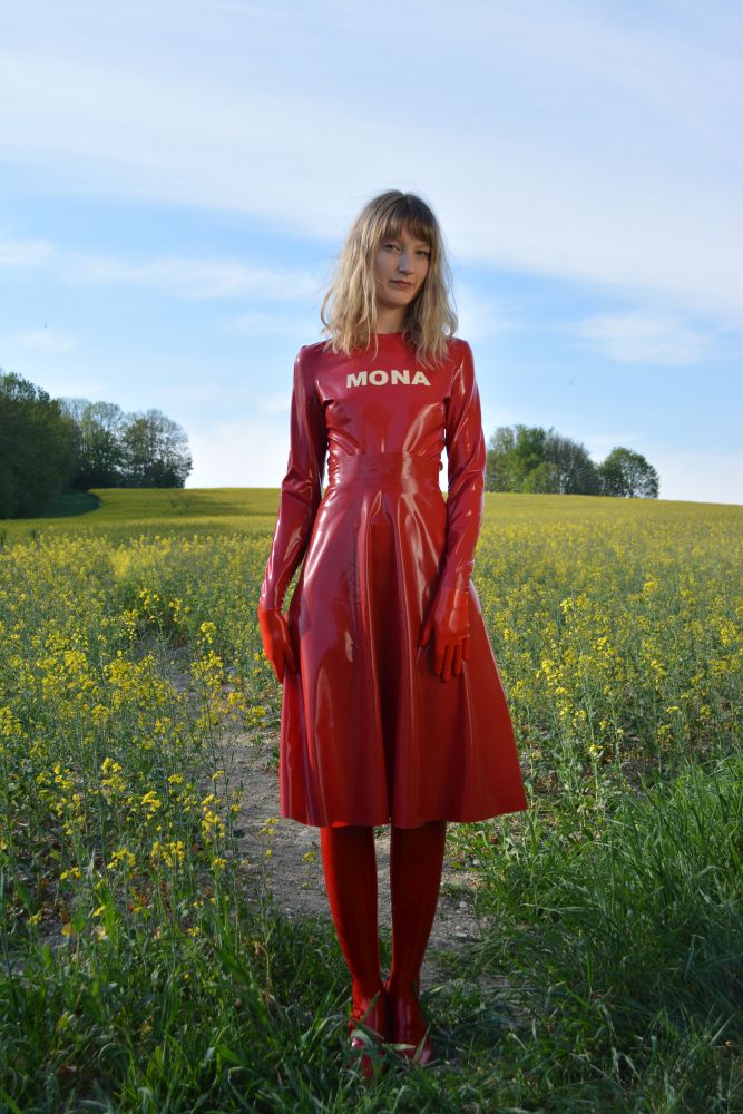 red latex midi skirt combined with red latex longseleeve