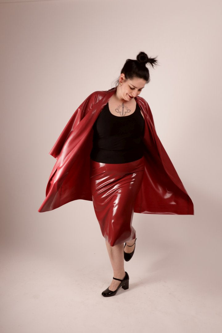 our model sadic sadie in our bordeaux latex fashion kimono and matching pencil skirt, shot in the middle of a little spin to let the kimono fly.
