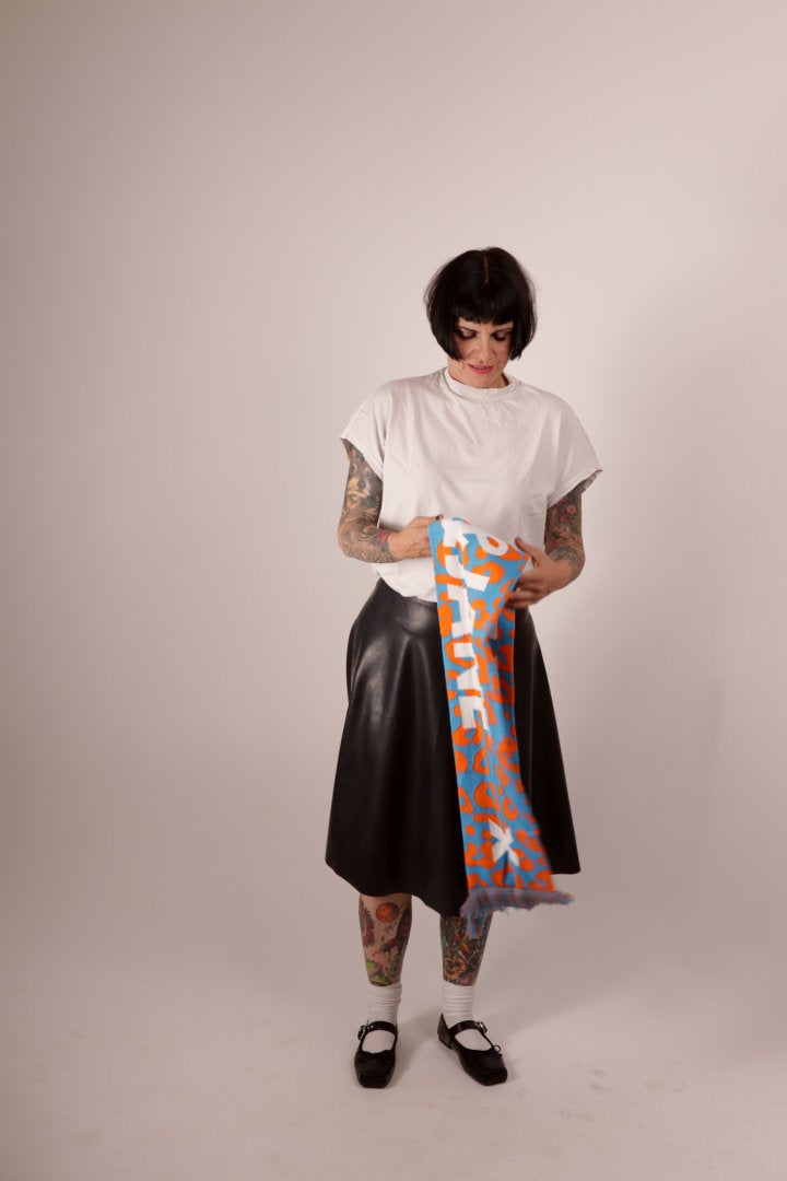 Model Anja von Abels unfolding her TARZA & JANE fan scarf. 