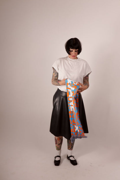 Model Anja von Abels unfolding her TARZA & JANE fan scarf. 
