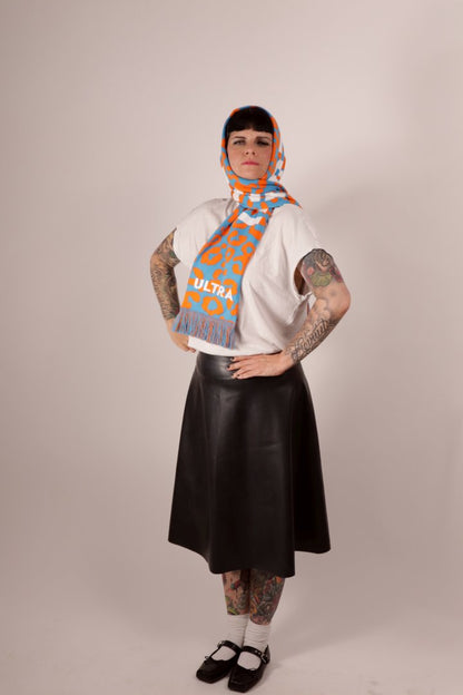 Model Anja wearing her TARZA & JANE fan scarf around her head and shoulders like a babushka.