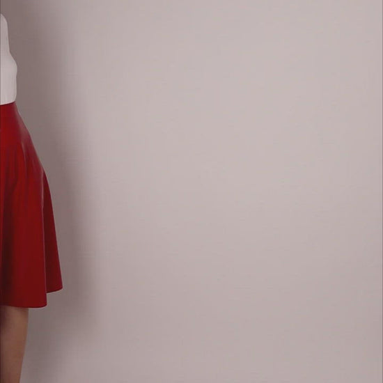 video of red latex midi skirt