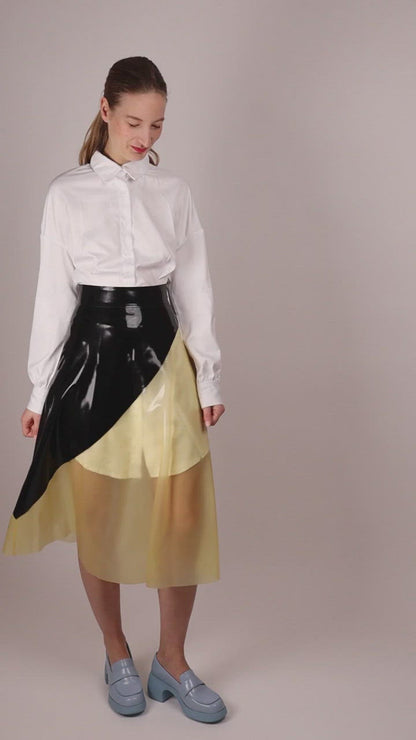 video-of-half-transparent-half-black-midi-latex-skirt