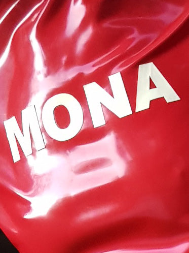 the-name-mona-in-white-latex-letters-on-red-latex