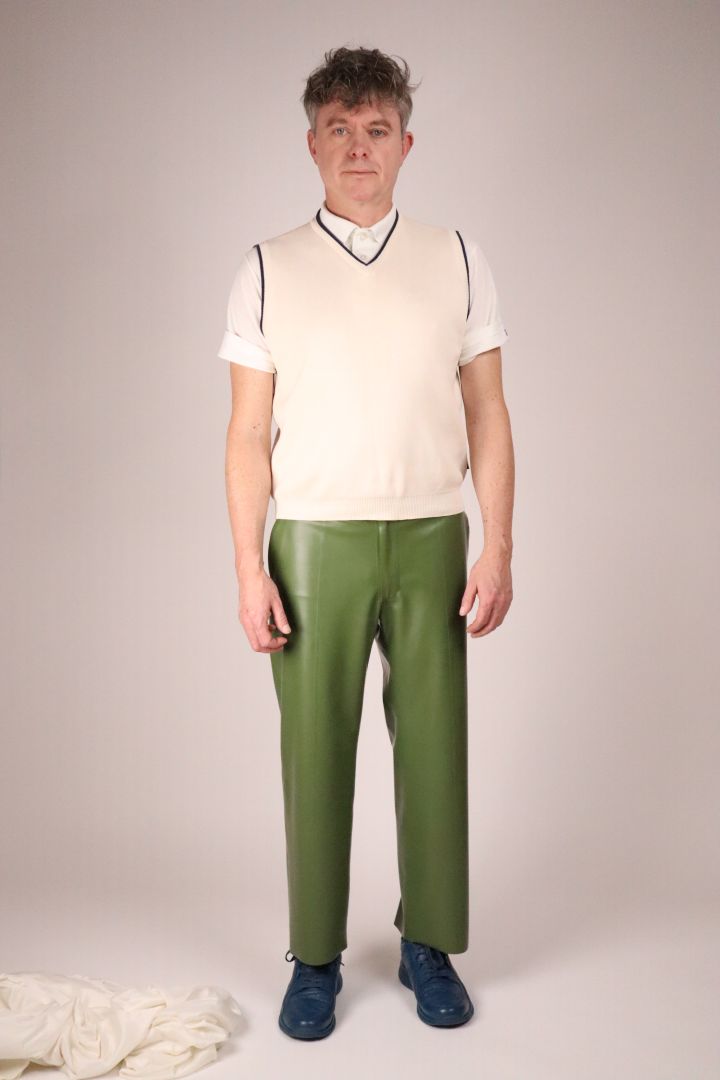 olive-green-latex-flat-front-pants-and-white-tennis-tank-top