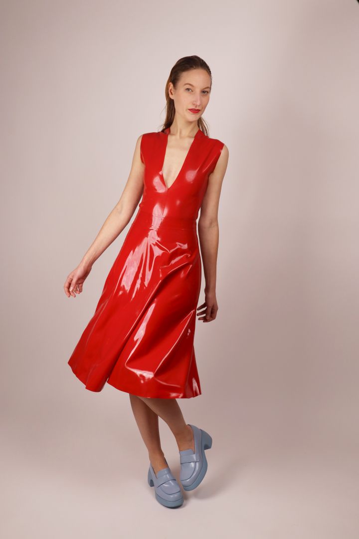 model-in-red-latex-v-neck-swimsuit-body-and-matching-red-latex-aline-skirt