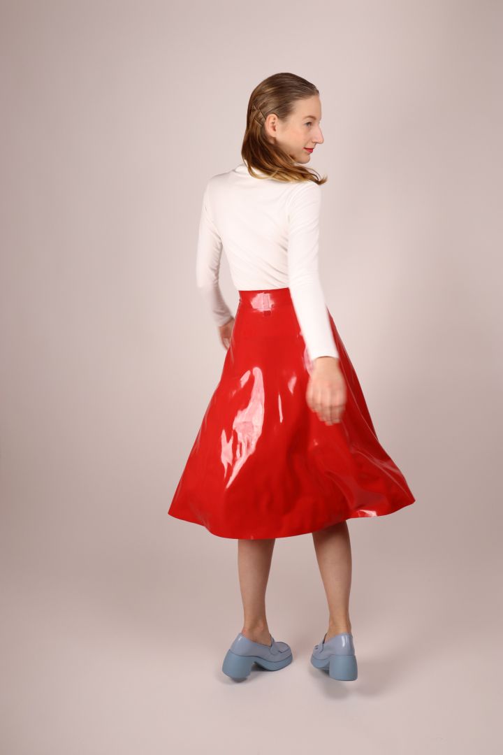 red latex midi skirt swinging