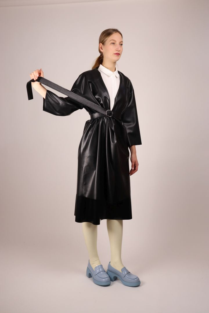 black-latex-trench-coat-with-belt-over-midi-skirt